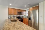 Updated with modern matching appliances, granite counters, and kitchen amenities